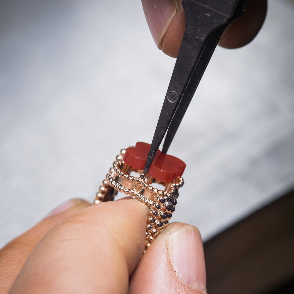 handcrafting a carnelian Van Cleef & Arpels Vintage Alhambra ring