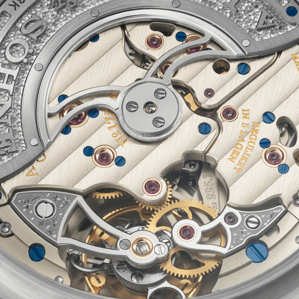 The A. Lange & Sohne Lange 1 Tourbillon Perpetual Calendar Lumen watch's caseback engraved with stars and a shooting star.