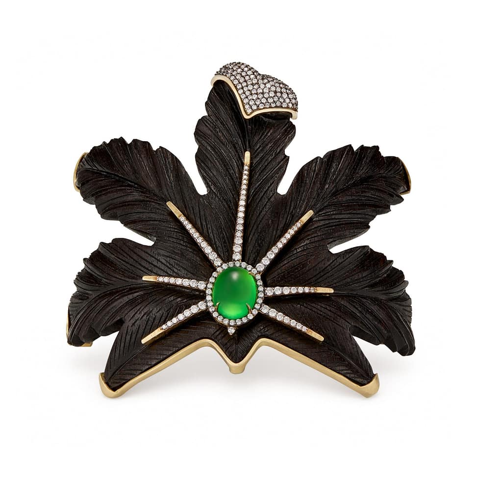 Leaf-shaped carved wood cuff bracelet with center green opal by Silvia Furmanovich for Asprey.