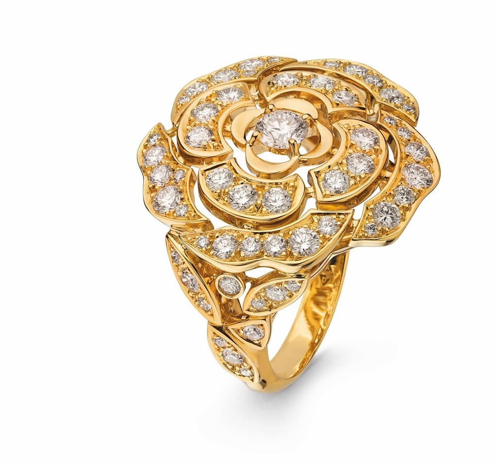 Chanel Bouton de Camélia ring with diamonds set in 18K yellow gold.