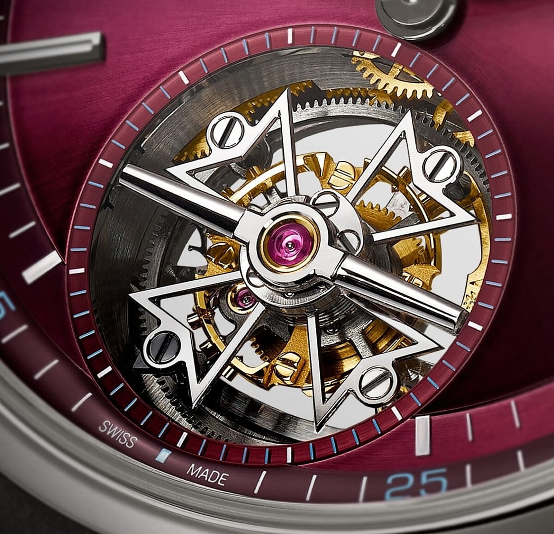 Close up photo of the Vacheron Constantin Overseas titanium tourbillon watch with red dial.