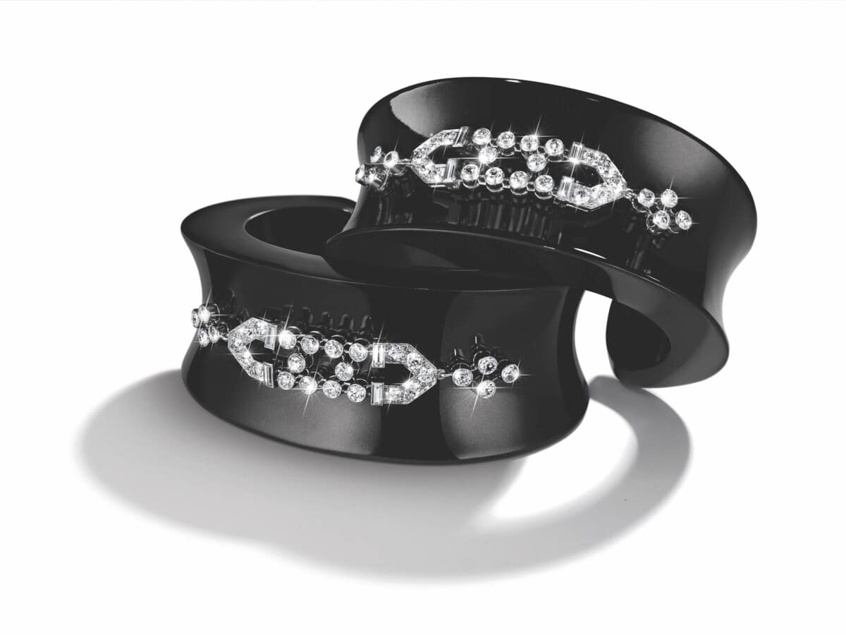 Belperron black jade cuff bracelets with diamond art deco style accents.