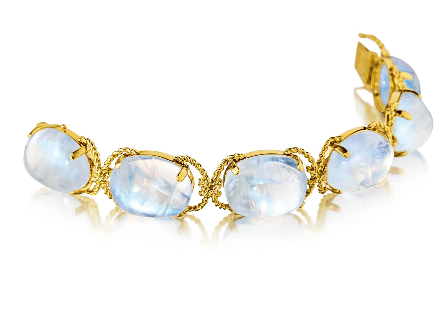 Verdura moonstone pebble bracelet with 6 large blue cabochon moonstones in gold.