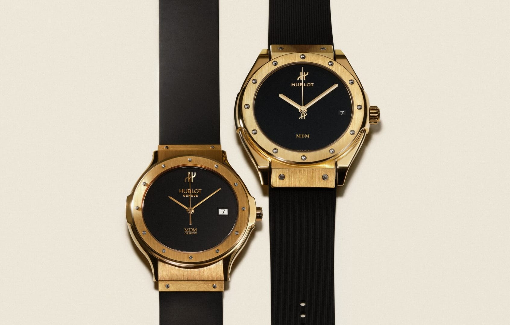 A vintage Hublot Classic Fusion gold watch on rubber strap next to the new Classic Fusion Tributo version.