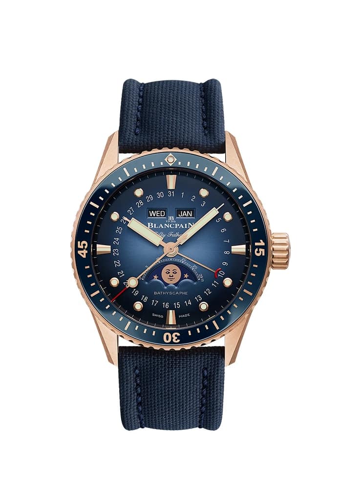 Blancpain Fifty Fathoms dive watch in red gold with calendar display and moon phase indicator.