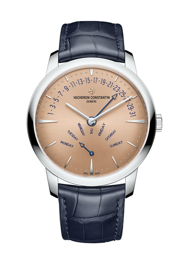 Vacheron Constantin Patrimony Retrograde Day-Date watch with day of the week and date displays on the salmon colored dial.