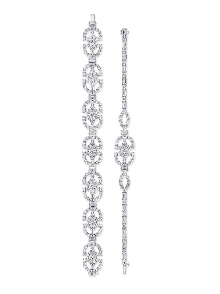 Two Harry Winston white gold and diamond bracelets.