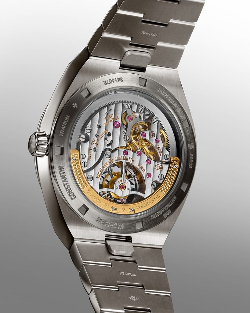 A view of the Vacheron Constantin Overseas Tourbillon watch movement in titanium with a red dial.