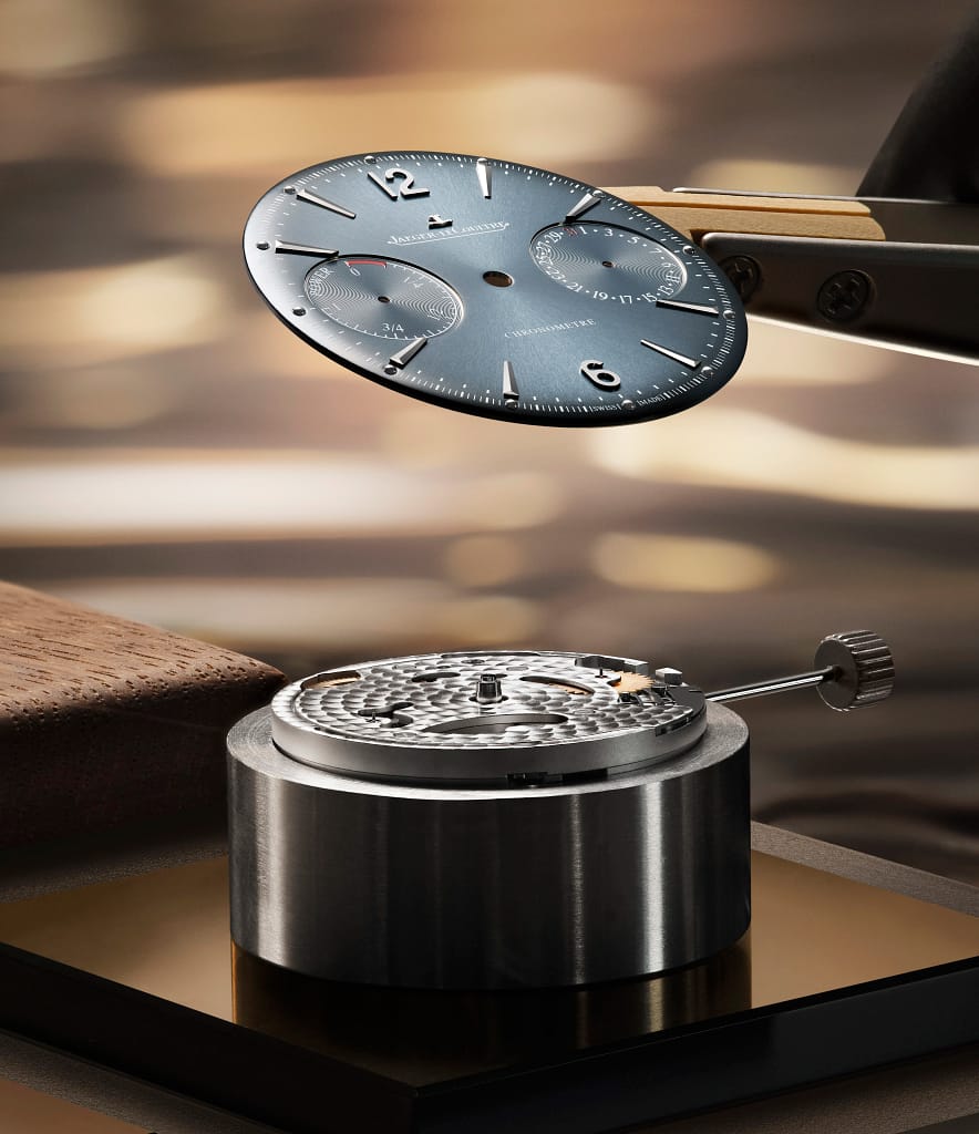 Placing the dial during assembly of the new Jaeger-LeCoultre Master Control Chronometre Power Reserve Date watch in stainless steel.