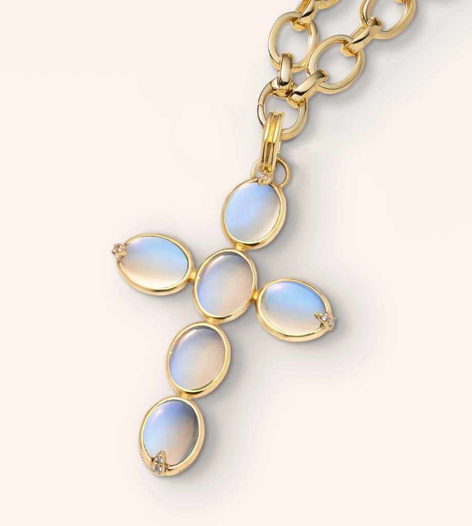 Monica Rich Kosann moonstone cross pendant set in gold with diamond accents