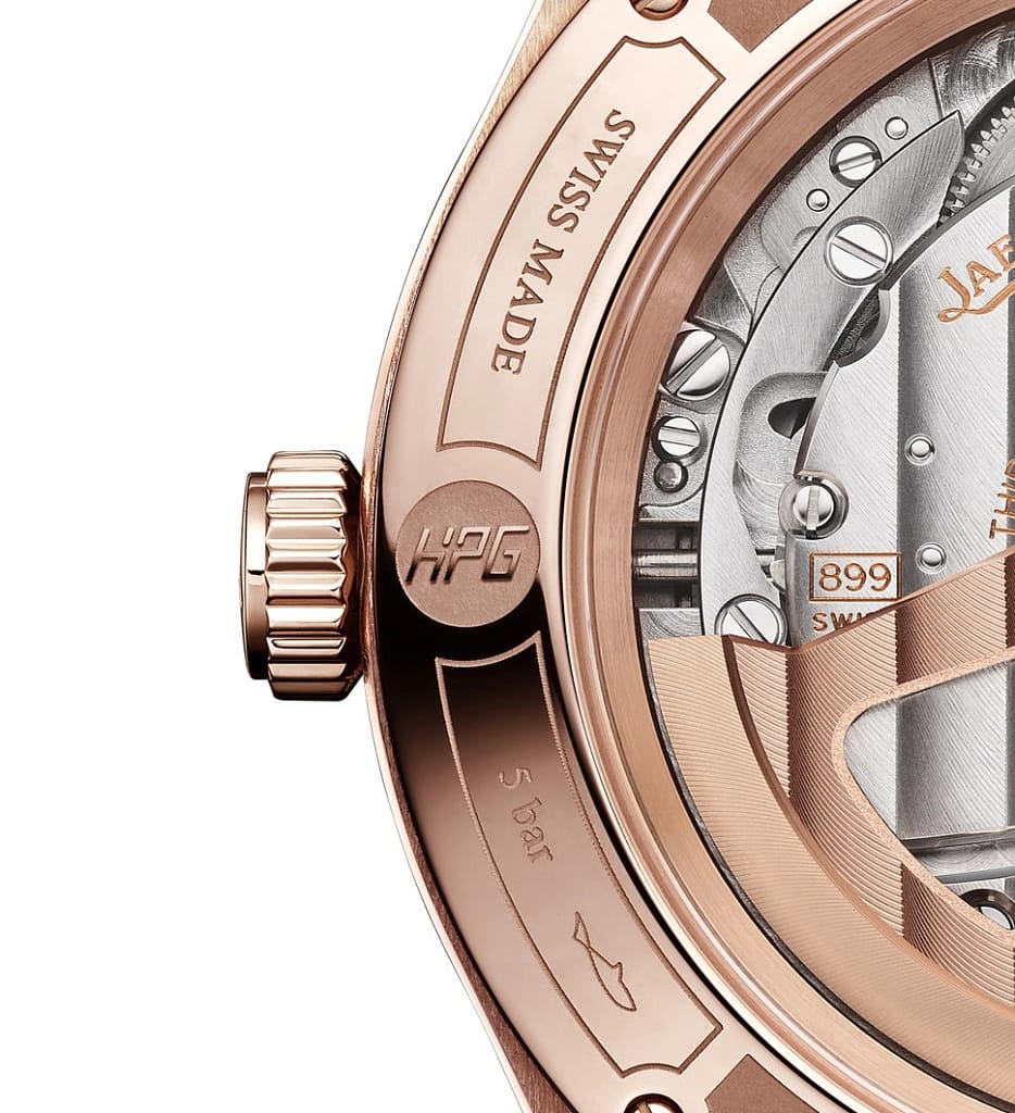 A closeup view of the case back of Jaeger-LeCoultre Master Control Chronometre Date watch in rose gold with the new HPG seal.